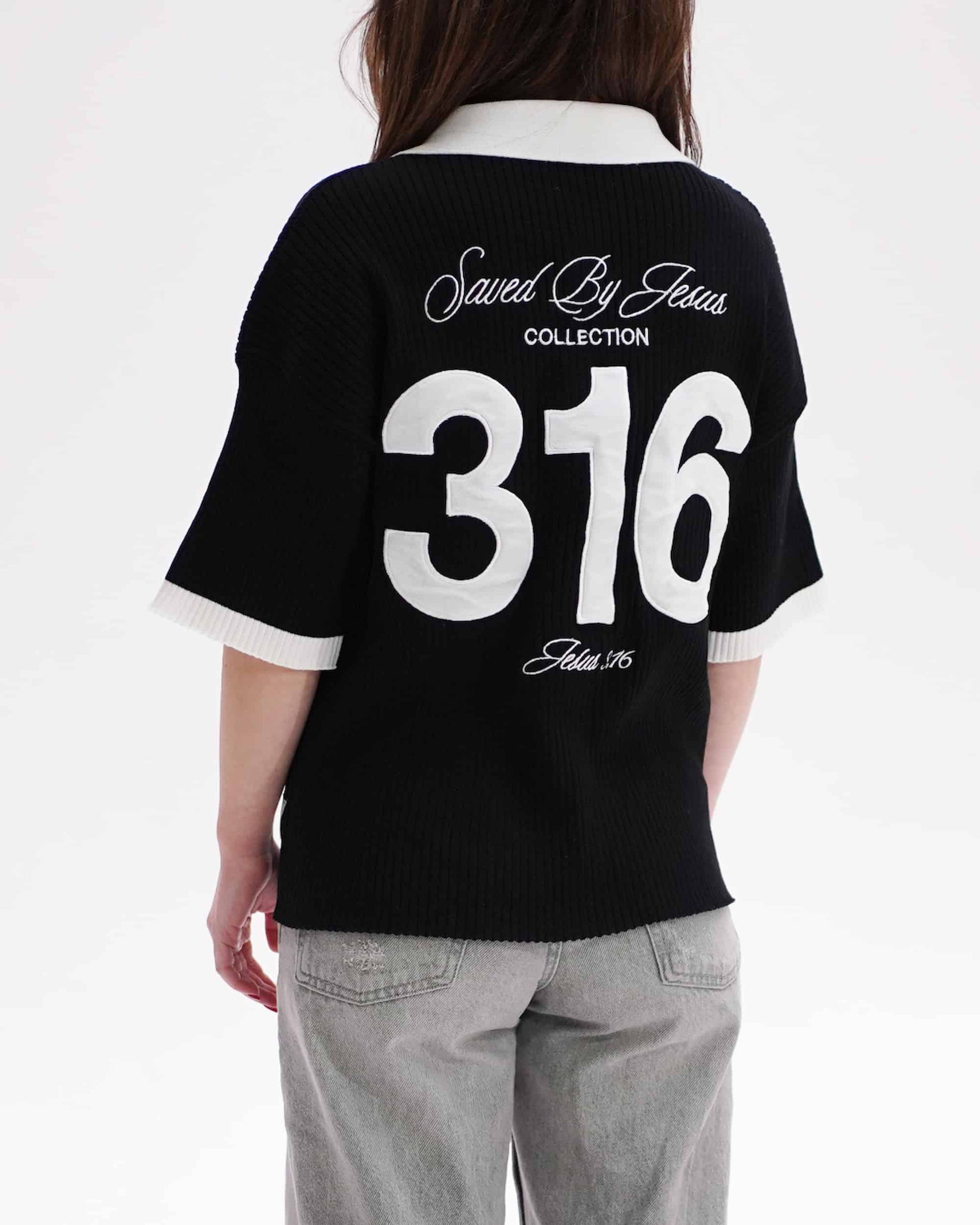 Person wearing a black jersey with 'Saved By Jesus Collection 316' text on the back.